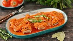 Fisch unter Marinade aus dem Ofen – saftig mit Rüebli-Zwiebel oder Kabis